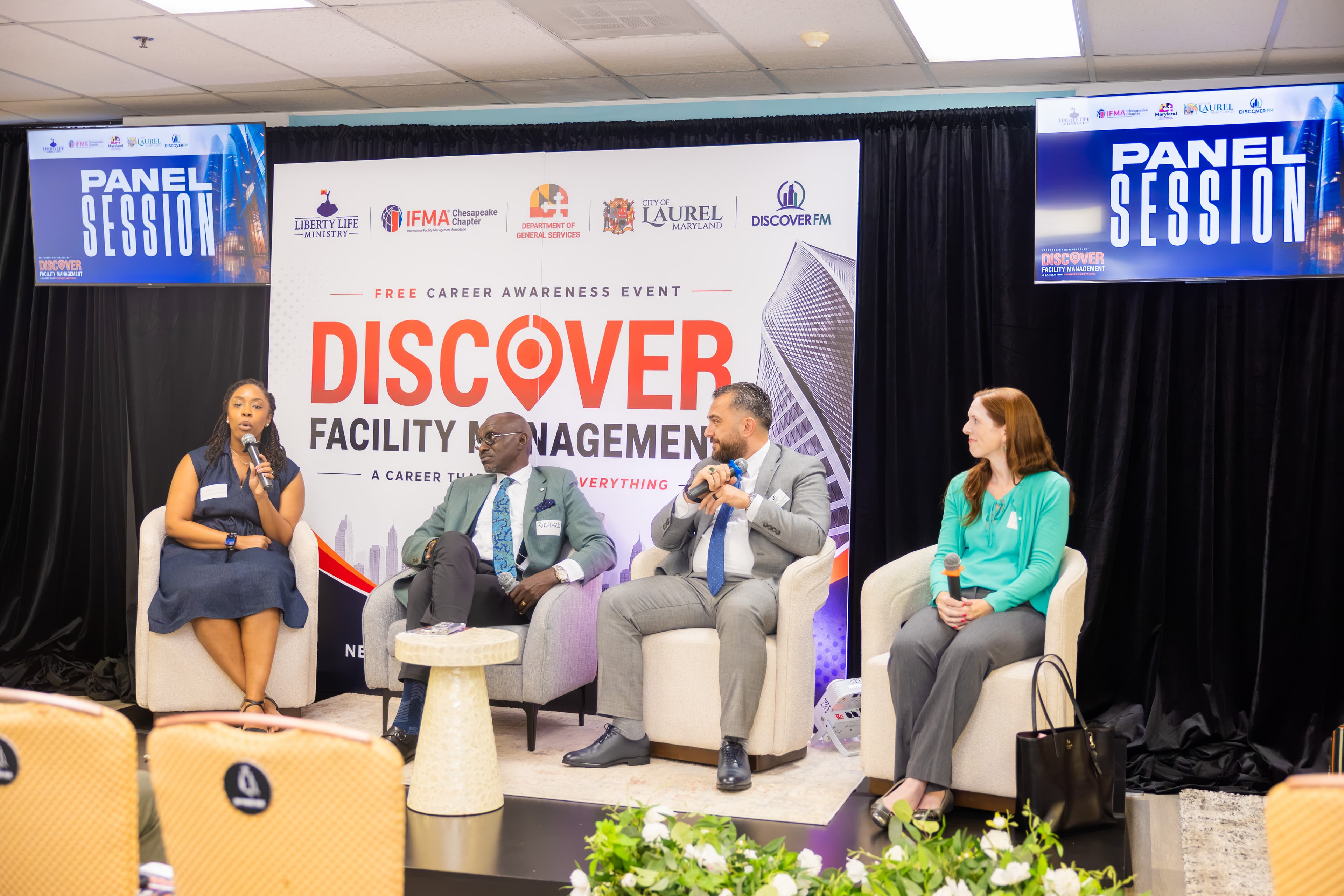 Four professionals participate in a panel discussion at the Discover Facility Management career event.